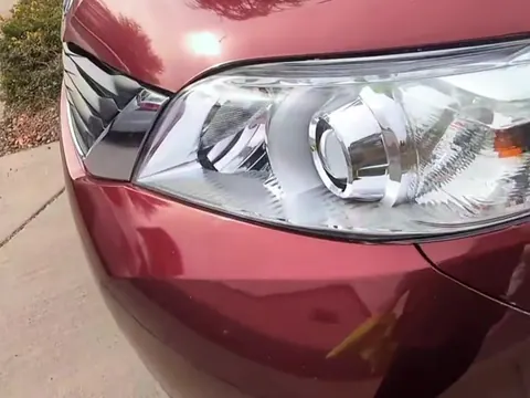 The same Toyota Sienna headlight restored clear